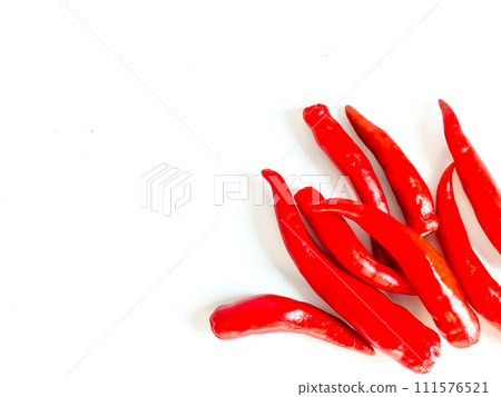 Fresh red chili and space for text on wooden background Fresh red chili and space for text on wooden background 111576521