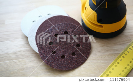Carpenters electrical tool on desk 111576904