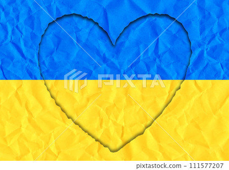 Torn paper in the shape of a heart in the colors of the Ukrainian flag Torn paper in the shape of a heart in the colors of the Ukrainian flag 111577207