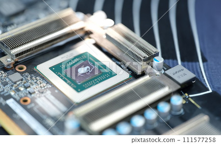 Thermal paste lying on processor from video card closeup Thermal paste lying on processor from video card closeup 111577258