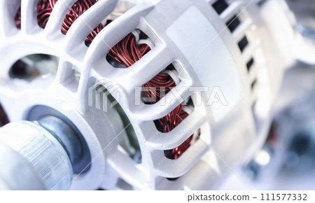 Closeup of white generator car repair parts Closeup of white generator car repair parts 111577332