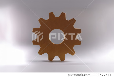 Golden detail of gear wheel of mechanism lying on gray background closeup Golden detail of gear wheel of mechanism lying on gray background closeup 111577344