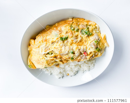 Omelet with pork and chili on rice on  the white background 111577961