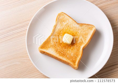 Butter toast seen from above 111578573