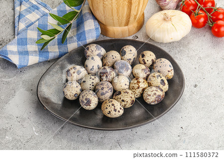 Raw quail eggs in the bowl Raw quail eggs in the bowl 111580372