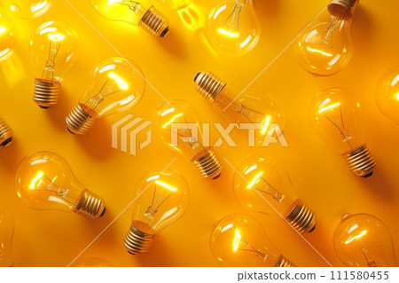 Light bulbs on yellow background, creative pattern. Light, technology, idea concept. Glowing light bulbs Light bulbs on yellow background, creative pattern. Light, technology, idea concept. Glowing light bulbs 111580455