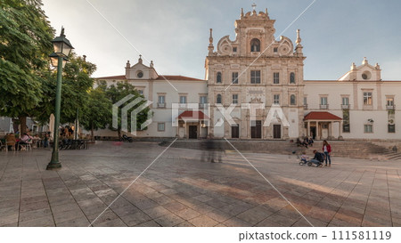 Panorama showing Sa da Bandeira Square with a view of the Santarem See Cathedral timelapse. Portugal 111581119