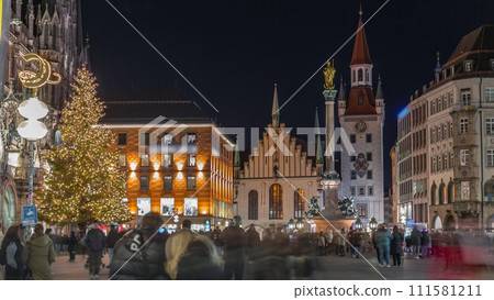 Marienplatz with the old Munich town hall and the Talburg Gate night timelapse, Bavaria, Germany. 111581211
