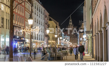 Historic buildings at the old town of Munich - sendlinger strasse night timelapse. Historic buildings at the old town of Munich - sendlinger strasse night timelapse. 111581227