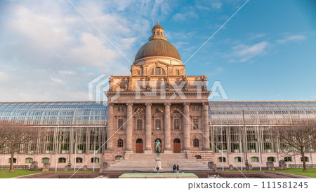 View of Bayerische Staatskanzlei timelapse during sunset, Bavarian State Chancellery building. Munich, Germany View of Bayerische Staatskanzlei timelapse during sunset, Bavarian State Chancellery building. Munich, Germany 111581245
