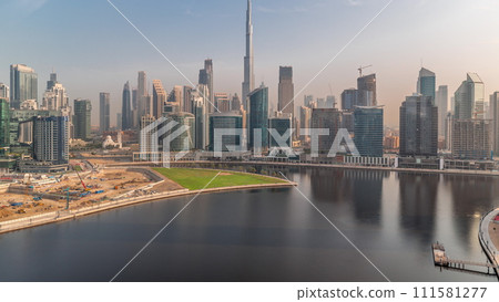 Aerial view to Dubai Business Bay and Downtown with the various skyscrapers and towers timelapse Aerial view to Dubai Business Bay and Downtown with the various skyscrapers and towers timelapse 111581277