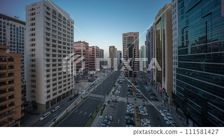 Residential buildings and modern city architecture of Abu Dhabi aerial timelapse during all night, UAE. Residential buildings and modern city architecture of Abu Dhabi aerial timelapse during all night, UAE. 111581427
