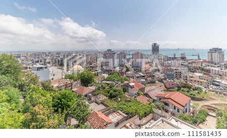 Panorama showing aerial view of city centre and the harbour of Durres timelapse from viewpoint, Albania. 111581435
