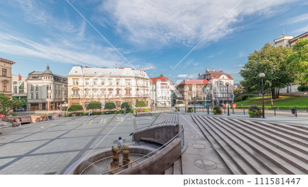 Panorama showing Sulkowski Castle and fountain on Chrobry Square in Bielsko-Biala timelapse, Poland. 111581447