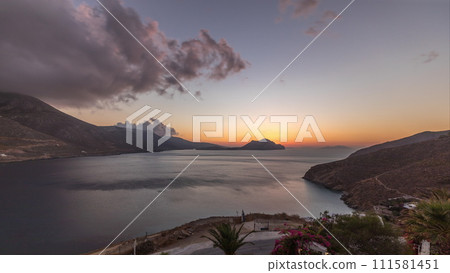 Panorama showing sunset on Amorgos island aerial timelapse from above. Greece 111581451