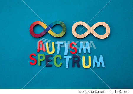 Celebrating Autism Acceptance Month. The gold infinity symbol 111581551