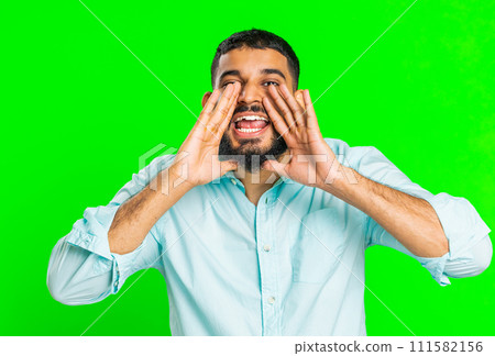 Indian man yell, shout, scream loud to camera, promotion advertisement sale, invitation, greetings 111582156