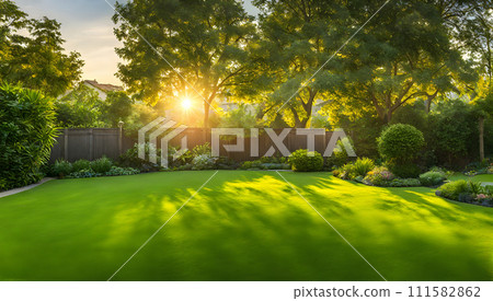 Wide green-trimmed lawn stretches across the backyard 111582862