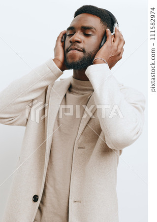 fashion man headphones dj music african background american happy teeth portrait black guy fashion man headphones dj music african background american happy teeth portrait black guy 111582974