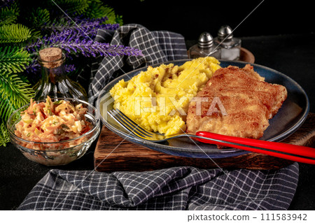 Fried cod fillet served. 111583942