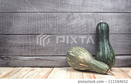 Zucchini harvest in summer. Marrow vegetables. Fresh courgette summer harvest Zucchini harvest in summer. Marrow vegetables. Fresh courgette summer harvest 111584032