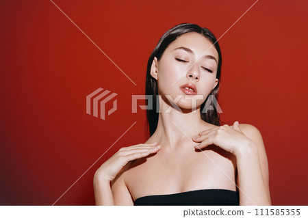 Radiant Beauty: Young Female Model with Attractive Face and Smooth Skin in Clean Studio Background 111585355