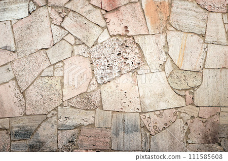 texture stone wall background. the wall of various rectangular shapes and gray stones with cracks 111585608