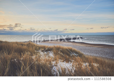 Danish coast on cold winter day 111586508