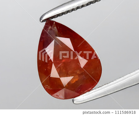 natural brown sapphire gem on the background natural brown sapphire gem on the background 111586918