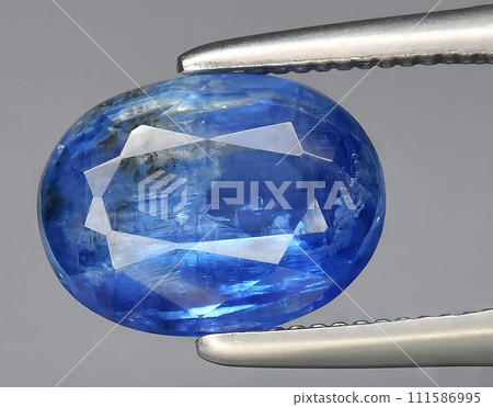 natural blue kyanite gem on the background natural blue kyanite gem on the background 111586995