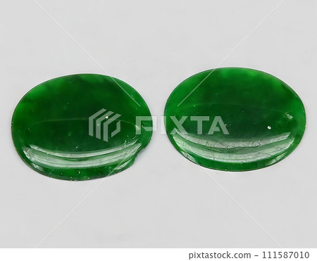 natural green jade gem on the background natural green jade gem on the background 111587010