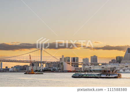 "Tokyo" water bus running in Tokyo Bay in the sunset 111588380