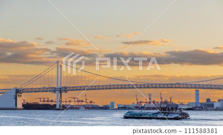 "Tokyo" water bus running in Tokyo Bay in the sunset 111588381