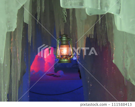 An artificial lantern inside an icicle cave 111588413