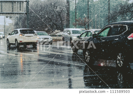 Snowy evening traffic Main road intersection C-4 Film style Snowy evening traffic Main road intersection C-4 Film style 111589503