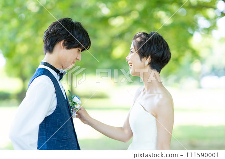 Bride and groom staring at each other Bride and groom staring at each other 111590001