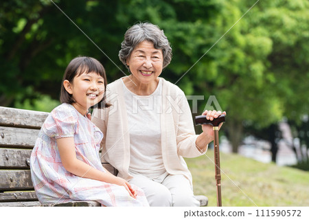 Senior playing with grandson 111590572