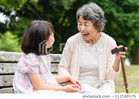 Senior playing with grandson 111590579