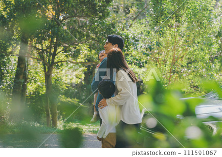 A family visiting the park by car A family visiting the park by car 111591067