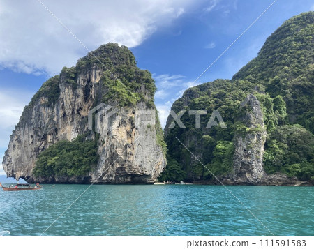 Cliffs and sea seen from a cruise ship Cliffs and sea seen from a cruise ship 111591583