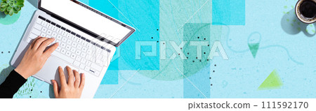 Person using a laptop computer Person using a laptop computer 111592170