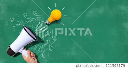 Attention and announcement concept with an idea light bulb flying to the sky like a rocket 111592179