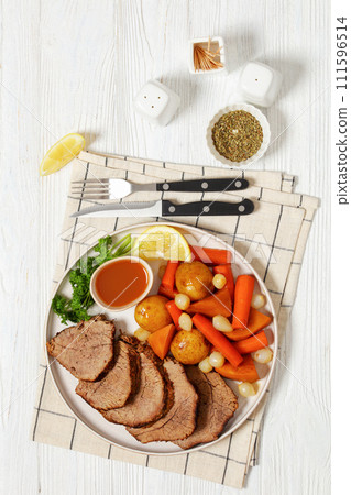 roast beef with dipping sauce and winter veggies roast beef with dipping sauce and winter veggies 111596514