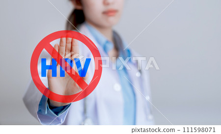 HPV (Human Papillomavirus), female doctor showing stop virus symbol Some strains infect the genitals and can cause cervical cancer. Concept of women's health. HPV (Human Papillomavirus), female doctor showing stop virus symbol Some strains infect the genitals and can cause cervical cancer. Concept of women's health. 111598071