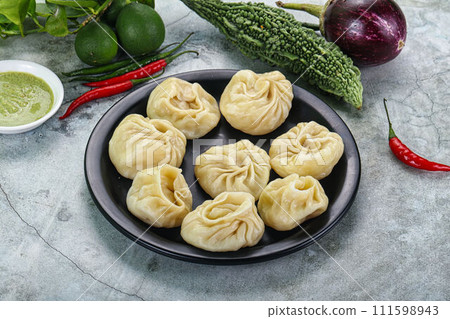 Nepali steamed dumplings  Momo with sause 111598943