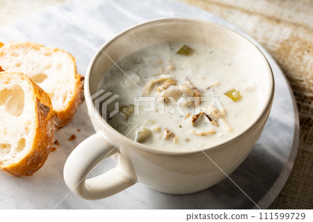 Warm, slightly steaming Boston clam chowder 111599729