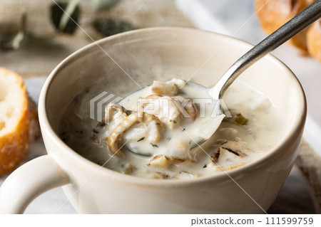Warm, slightly steaming Boston clam chowder 111599759