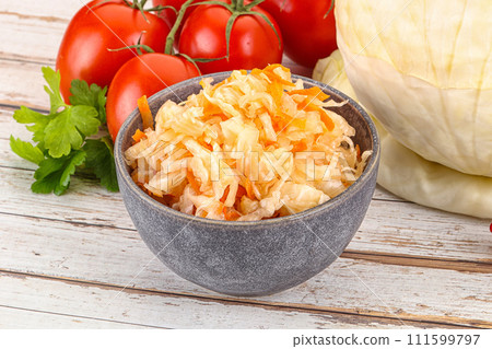 Fermented cabbage sauerkraut in the bowl Fermented cabbage sauerkraut in the bowl 111599797
