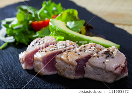 Lightly roasted tuna fillet Lightly roasted tuna fillet 111605872