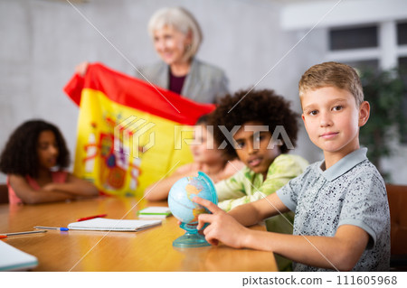 Portrait of a schoolboy, studying the history of the country of Spain 111605968